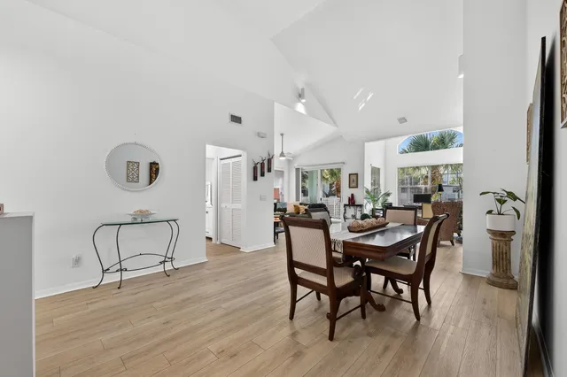 a living room with furniture and a clock