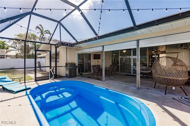 a front view of a house with swimming pool