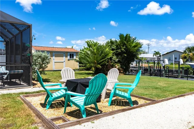 a view of a two chairs in a patio
