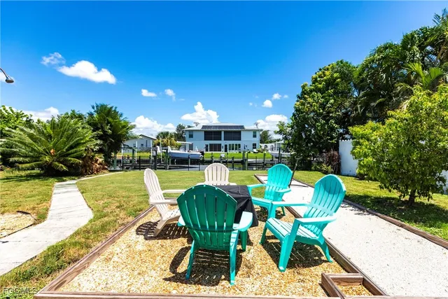 a view of a swimming pool with a patio