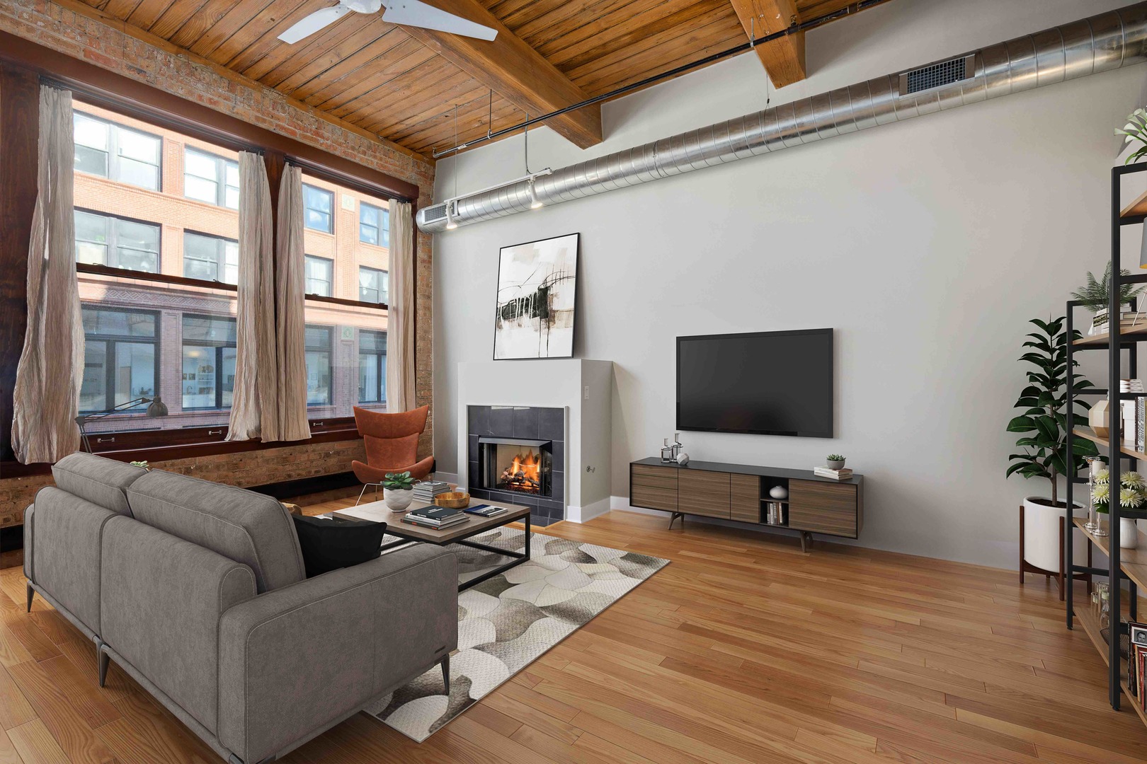 2303 South Michigan Avenue, Unit 305 Chicago, IL 60616 - Photo 7 of 22 a living room with furniture and a flat screen tv