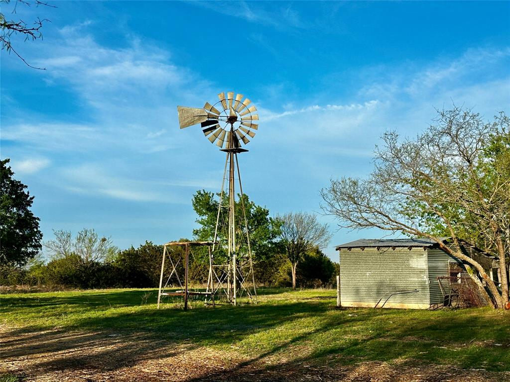 3575 Fm Jonesboro, TX 76538 - Photo 26 of 33 a front view of a house with a yard