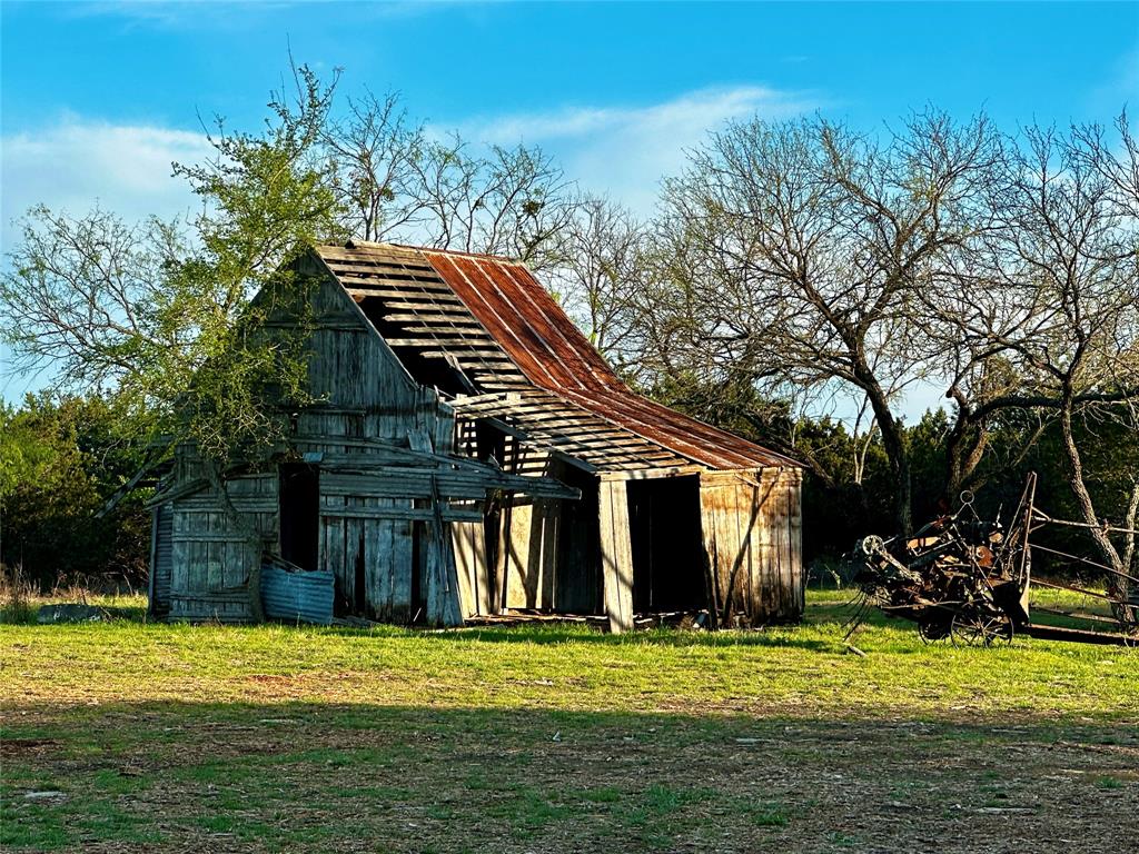 3575 Fm Jonesboro, TX 76538 - Photo 27 of 33 a front view of a house with a yard