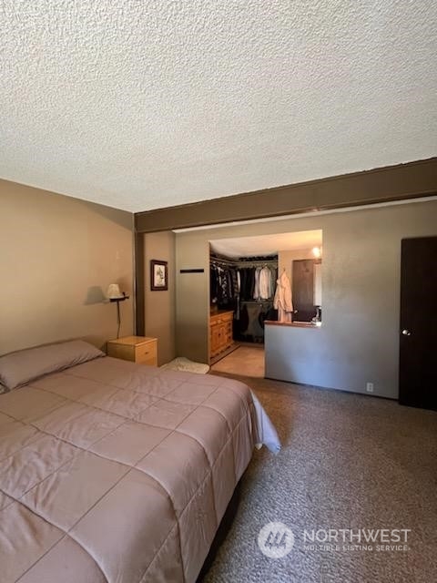 592 North Military Road Winlock, WA 98596 - Photo 17 of 21 a bedroom with a large bed and a large closet