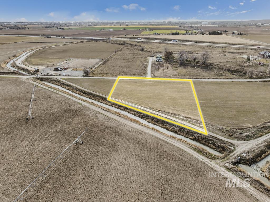 3 300 South Road Paul, ID 83347 - Photo 3 of 12 Aerial view of sparsely populated area with property parcel outlined