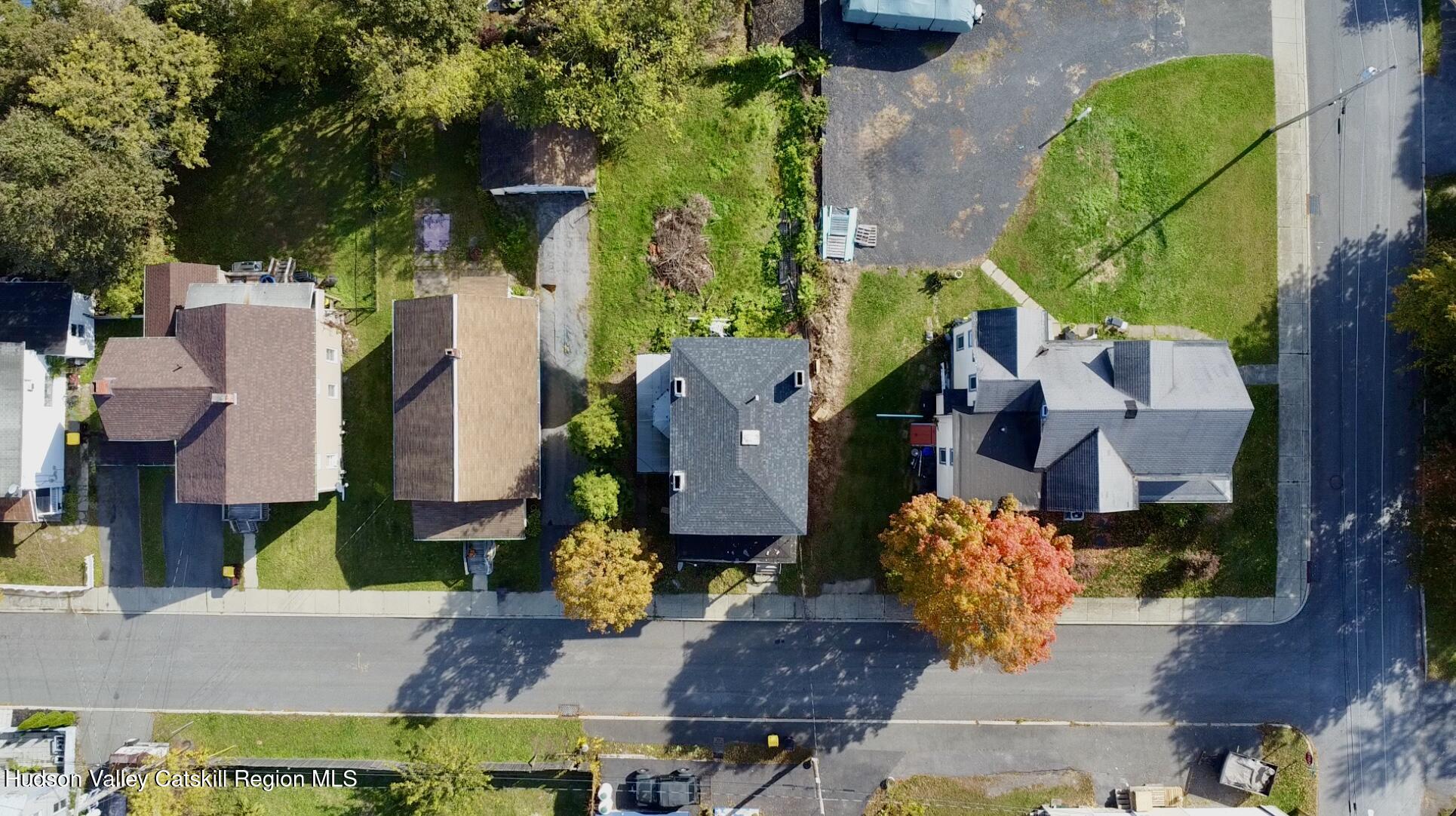 8 Howell Street Catskill, NY 12414 - Photo 12 of 14 an aerial view of multiple houses with a yard