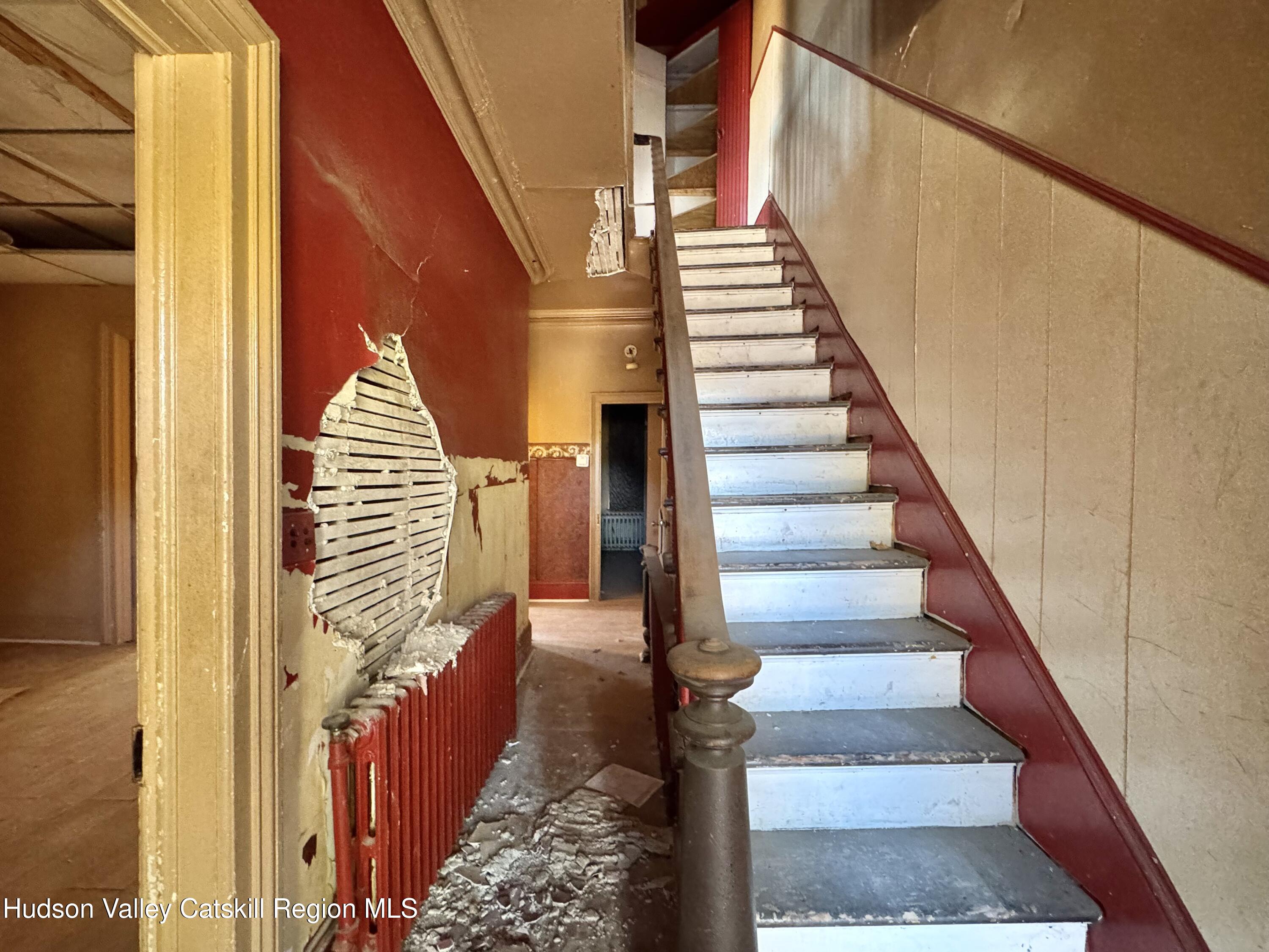 8 Howell Street Catskill, NY 12414 - Photo 6 of 14 a view of entryway and hall with wooden floor