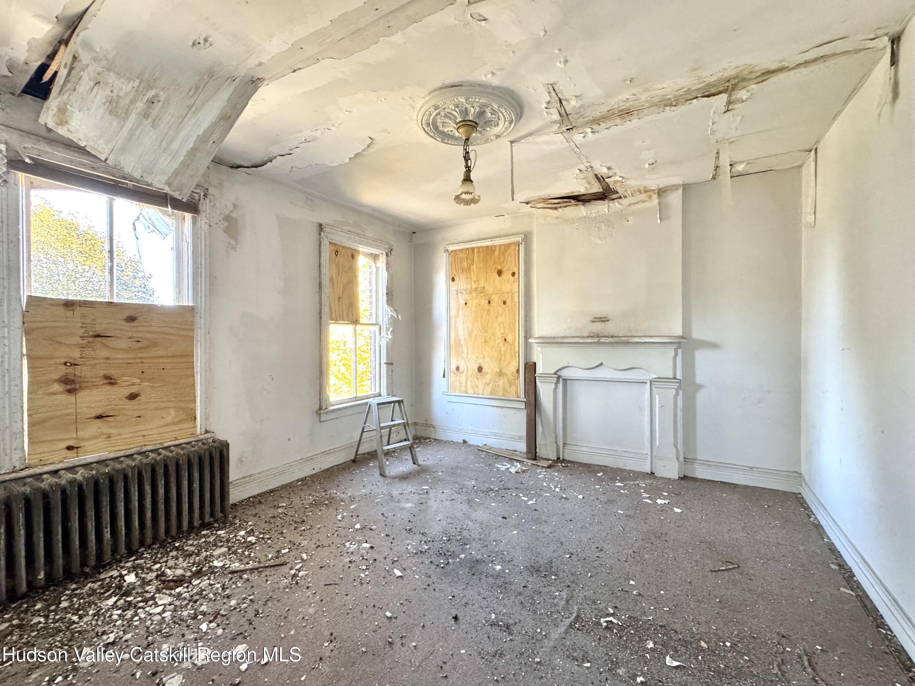 8 Howell Street Catskill, NY 12414 - Photo 9 of 14 a view of a kitchen with a sink and a window