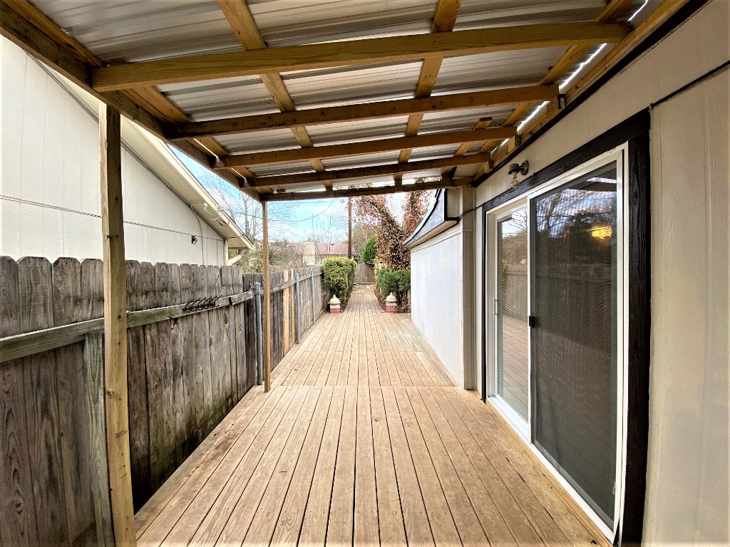 5502 Honey Dew Terrace Austin, TX 78749 - Photo 17 of 18 a view of a balcony with wooden floor