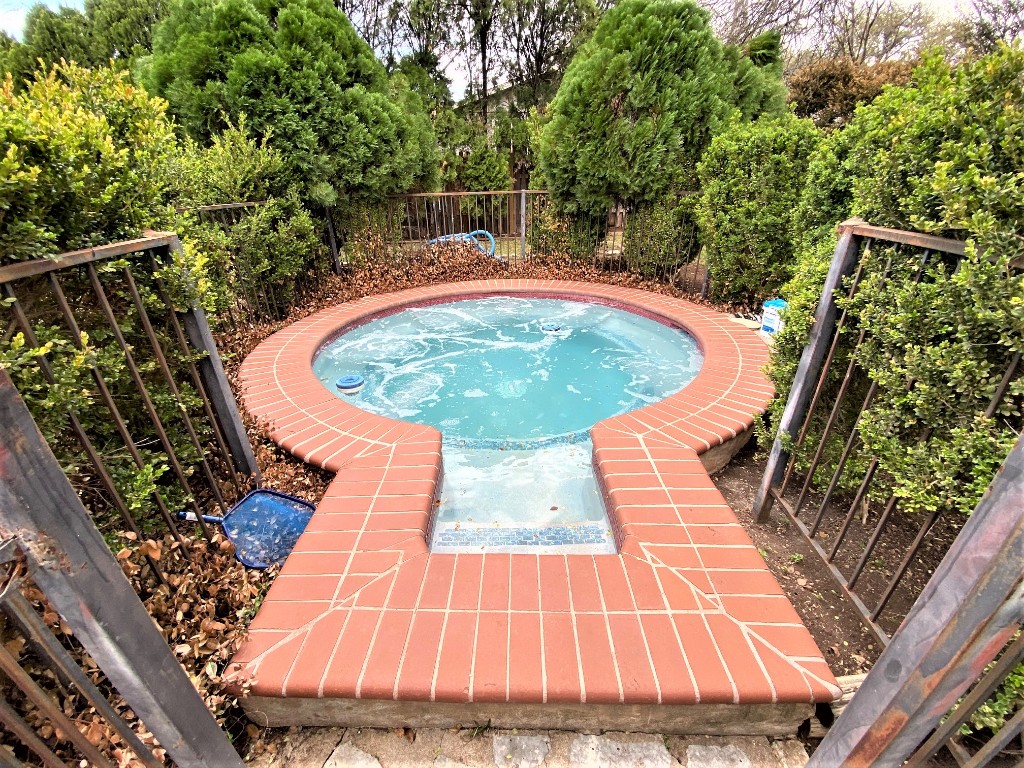 5502 Honey Dew Terrace Austin, TX 78749 - Photo 18 of 18 a view of a swimming pool with a patio