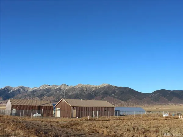 front view of a house with a mountain view