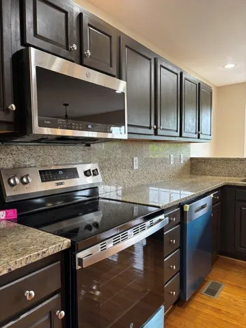 a view of a room with racks on the wall