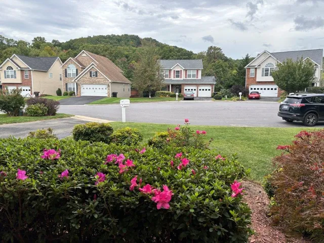 a kitchen with a refrigerator and a sink