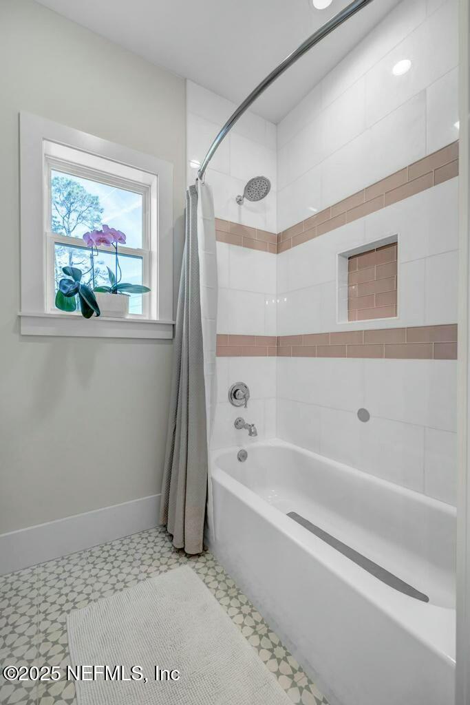 564 A1A North Ponte Vedra Beach, FL 32082 - Photo 29 of 34 a bathroom with a bathtub and a shower