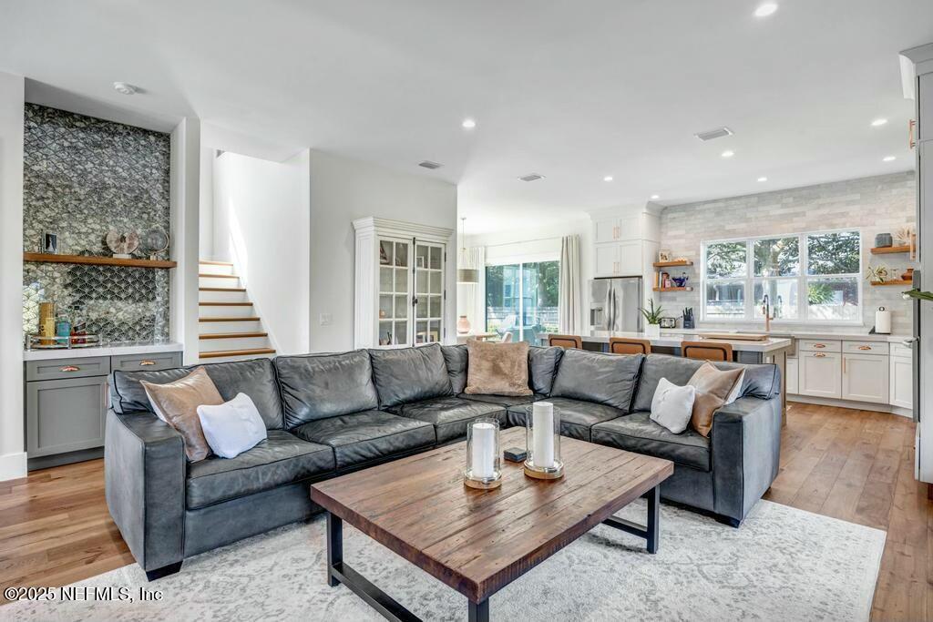 564 A1A North Ponte Vedra Beach, FL 32082 - Photo 3 of 34 a living room with furniture and a large window
