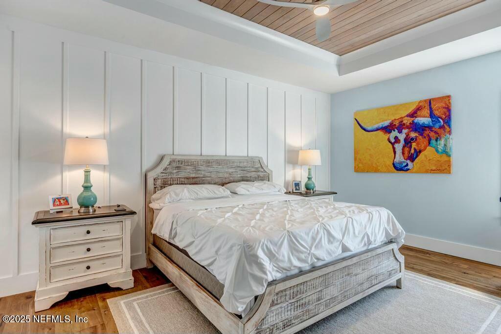 564 A1A North Ponte Vedra Beach, FL 32082 - Photo 7 of 34 a bedroom with a bed and a dresser