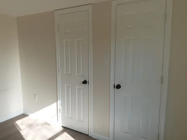 a view of a closet area in the balcony