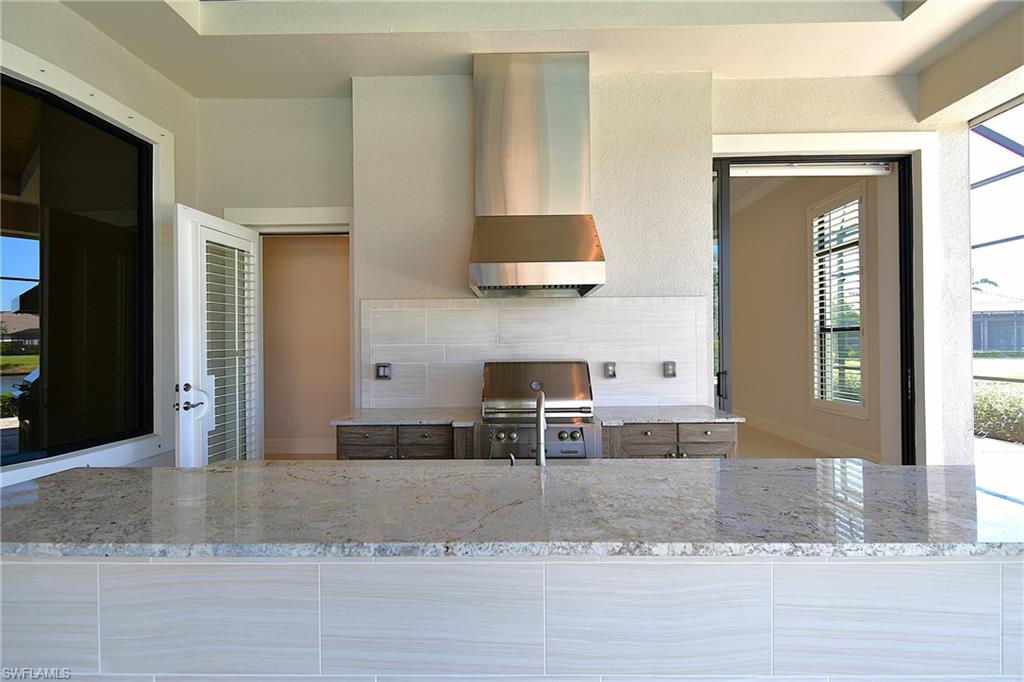 6604 Costa Circle Naples, FL 34113 - Photo 40 of 50 Outdoor Kitchen
