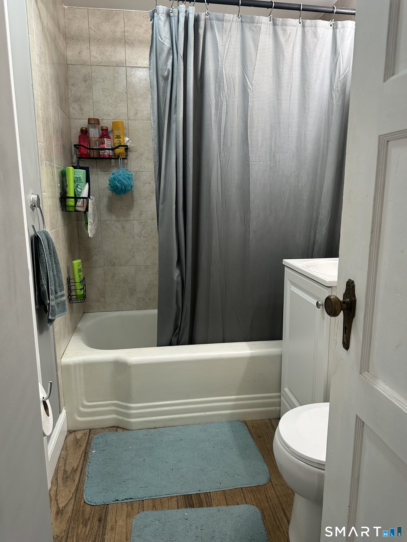 1031 Meriden Road Waterbury, CT 06705 - Photo 11 of 30 a bathroom with a sink and a toilet