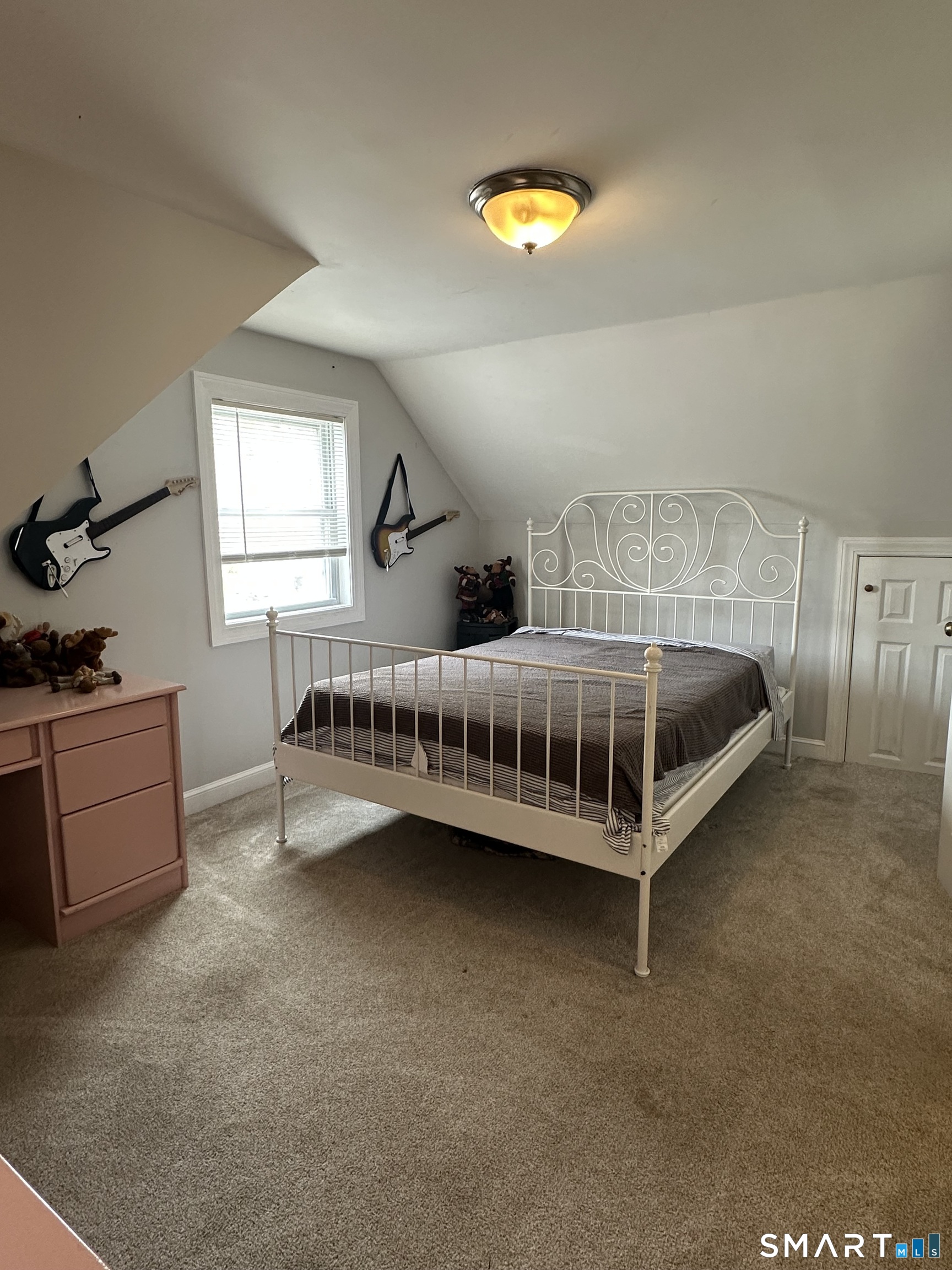 1031 Meriden Road Waterbury, CT 06705 - Photo 15 of 30 a view of a bedroom with furniture and window