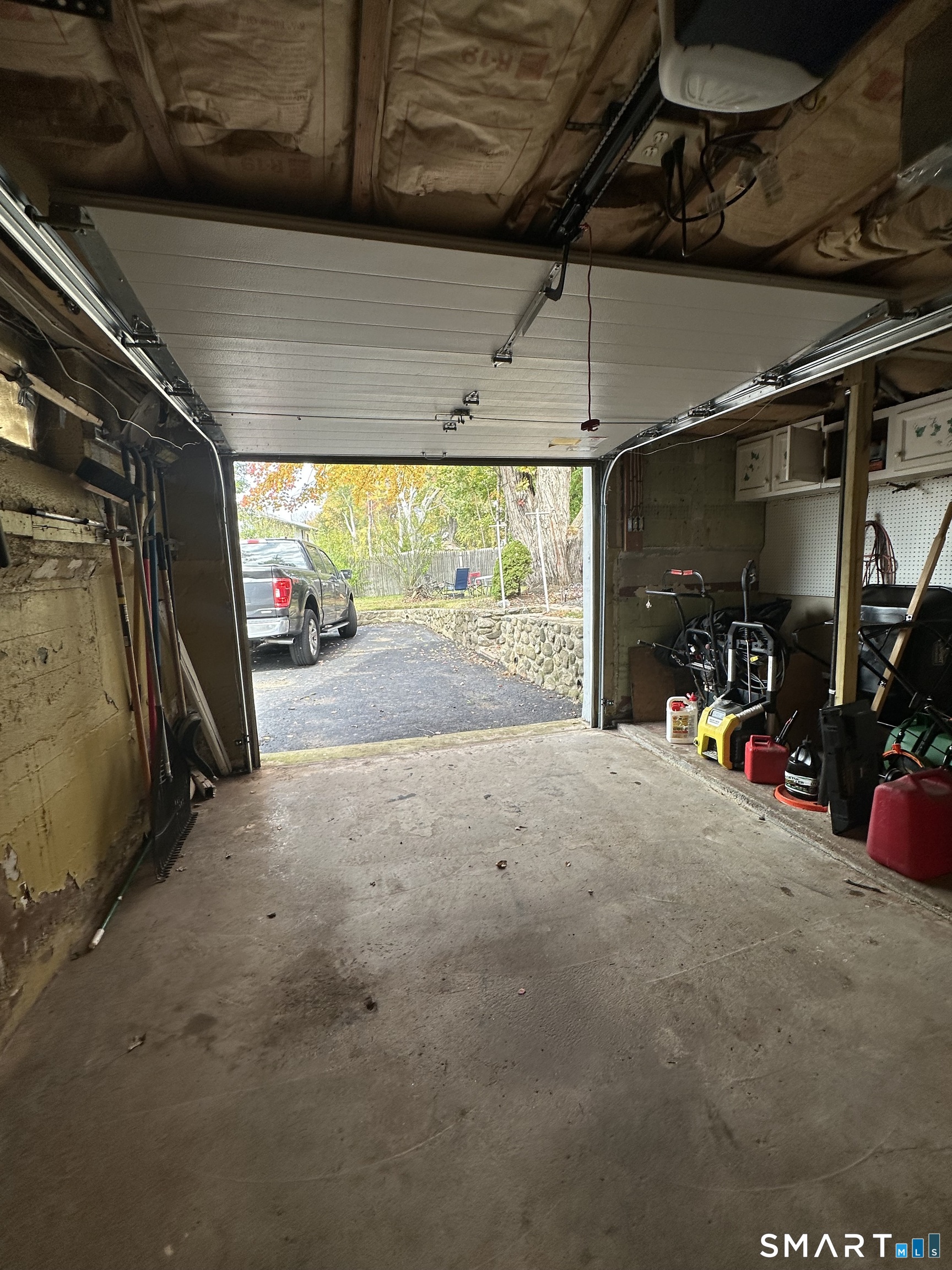 1031 Meriden Road Waterbury, CT 06705 - Photo 25 of 30 a view of a garage with the view of a garage