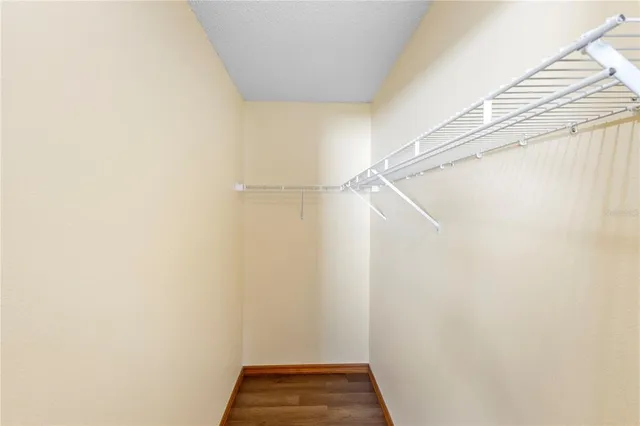 a kitchen with a refrigerator and a sink