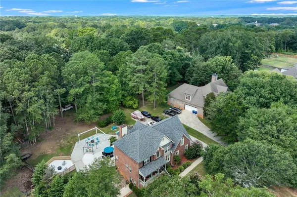an aerial view of a house with mountain view