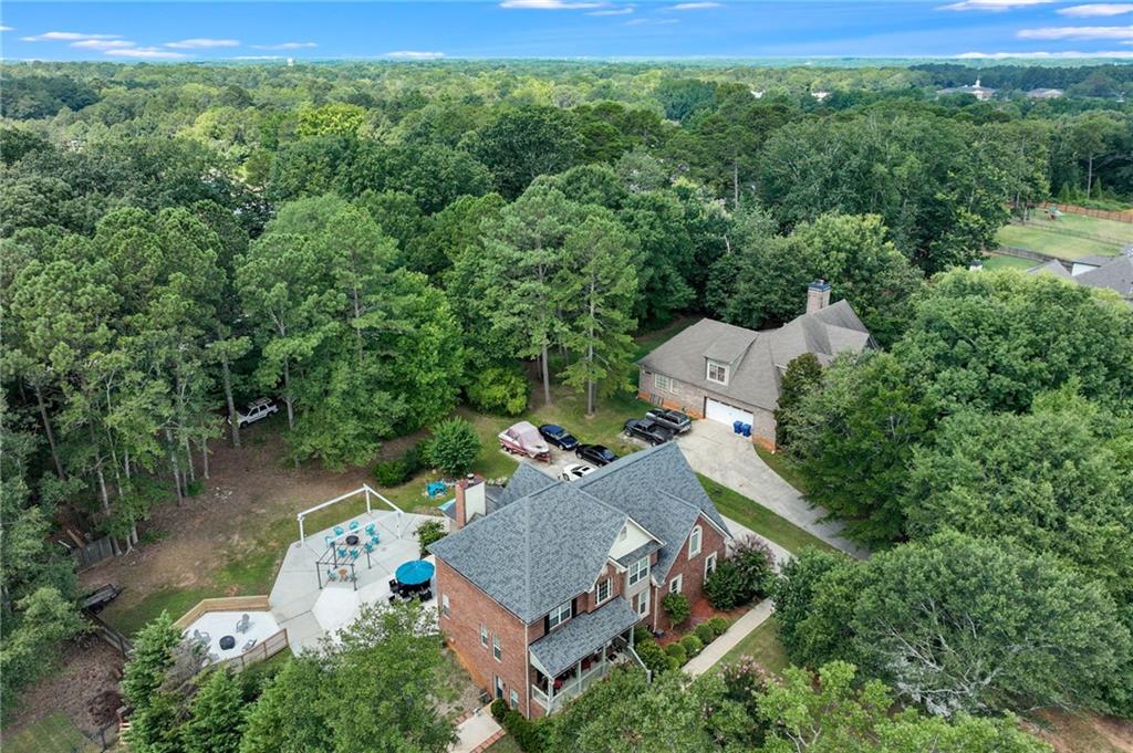 32 St Ives Circle Winder, GA 30680 - Photo 4 of 38 an aerial view of a house with mountain view