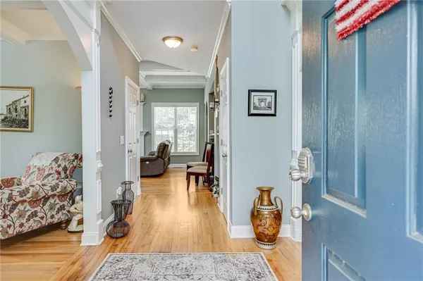 a living room with furniture and a table