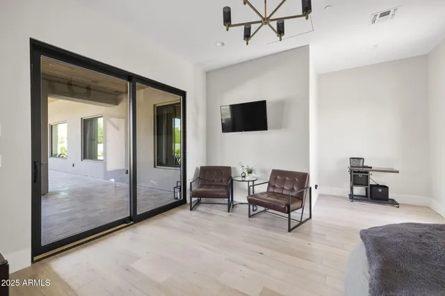 an aerial view of a house with a big yard