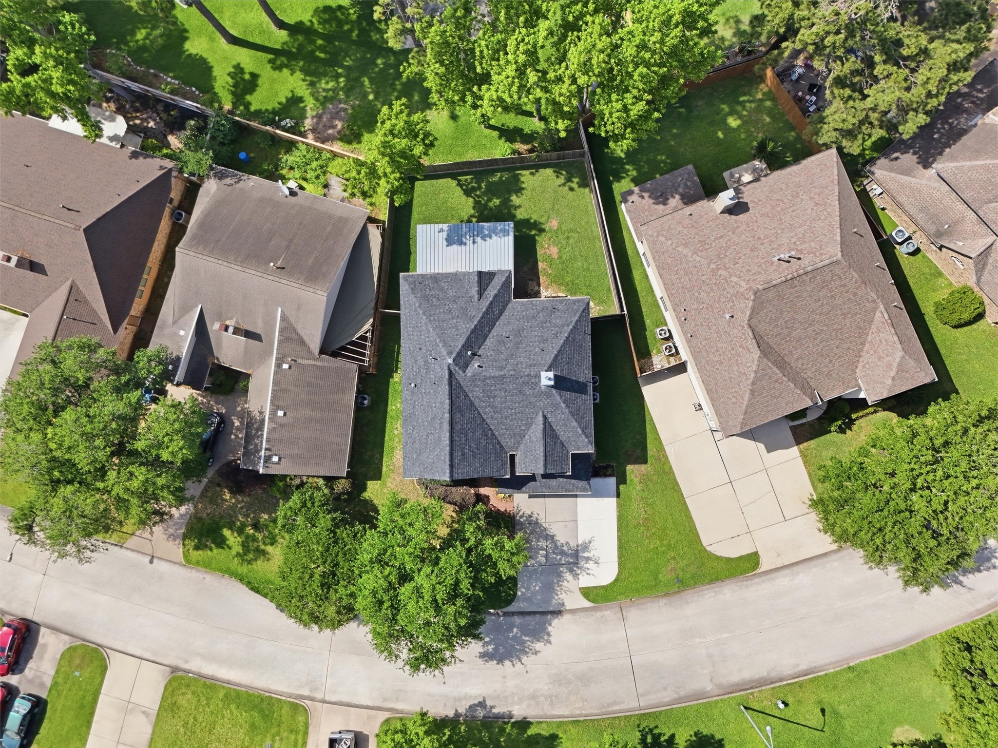 8827 Mile Run Road Humble, TX 77346 - Photo 30 of 37 an aerial view of a house with yard and green space