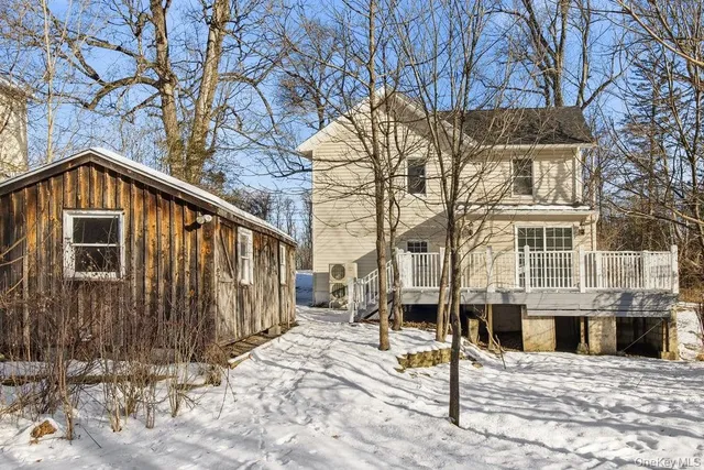 a front view of a house with parking space