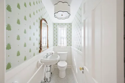 a view of livingroom with a fireplace wooden floor and staircase
