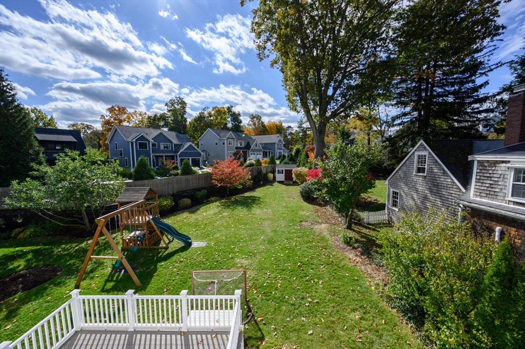 19 Lantern Lane Milton, MA 02186 - Photo 29 of 39 a front view of a house with garden