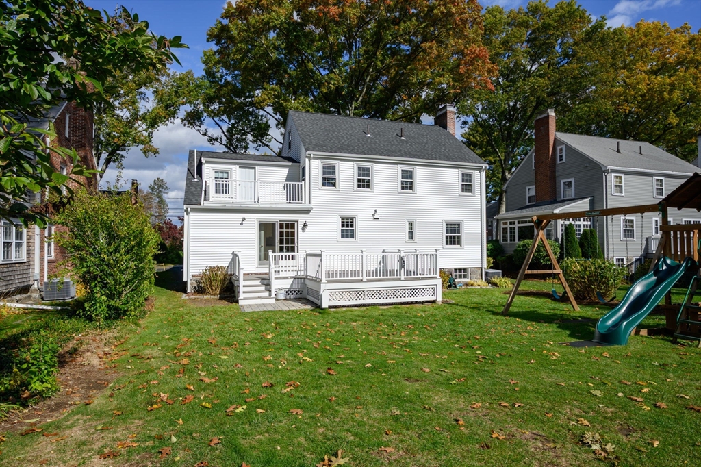 19 Lantern Lane Milton, MA 02186 - Photo 34 of 39 a view of a house with a yard and sitting area