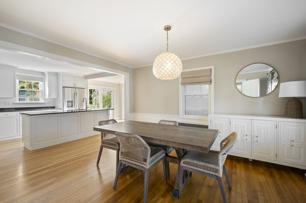 19 Lantern Lane Milton, MA 02186 - Photo 5 of 39 a view of a dining room with furniture window and wooden floor