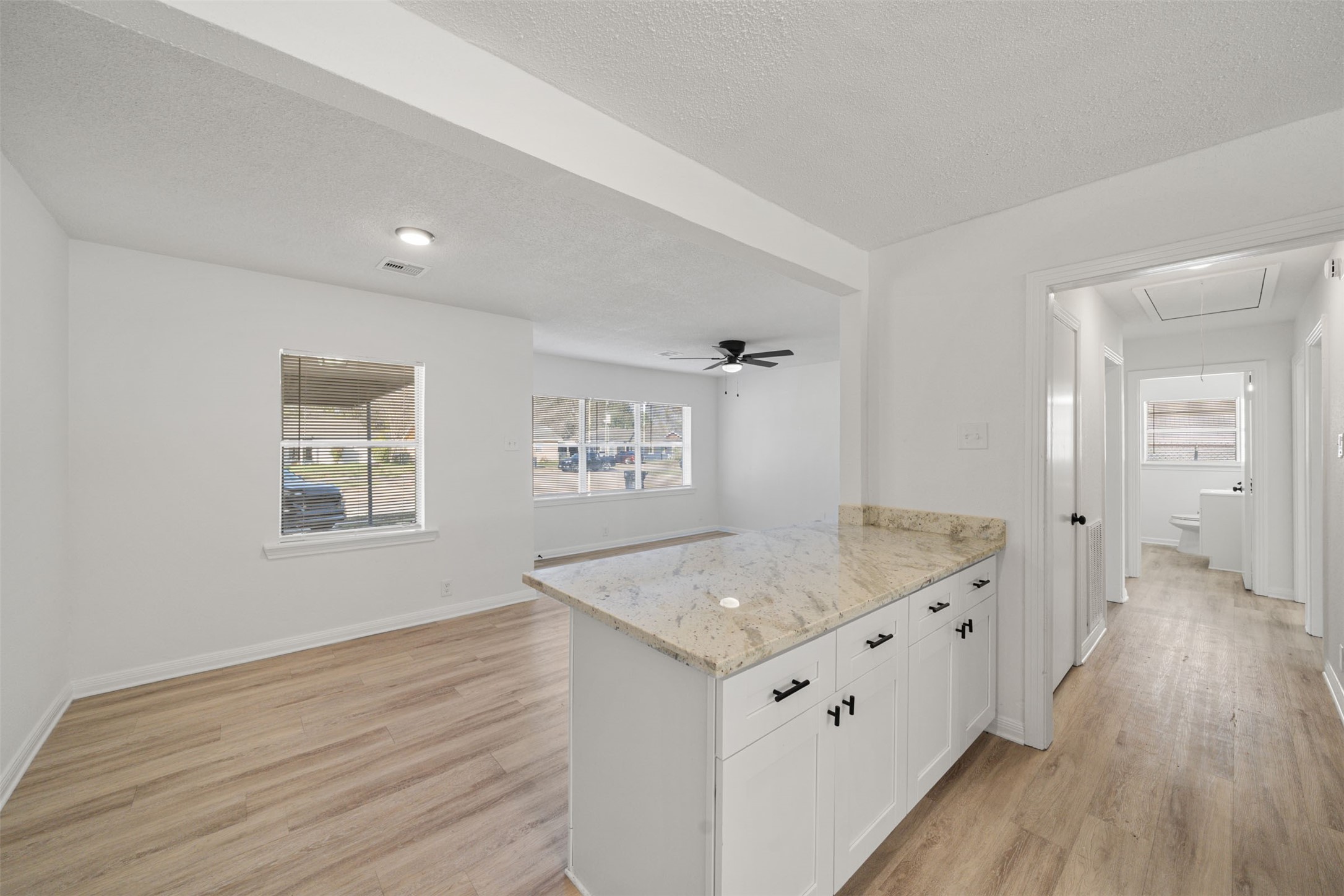 4601 West 43rd Street Houston, TX 77092 - Photo 12 of 40 a view of kitchen island with wooden floor