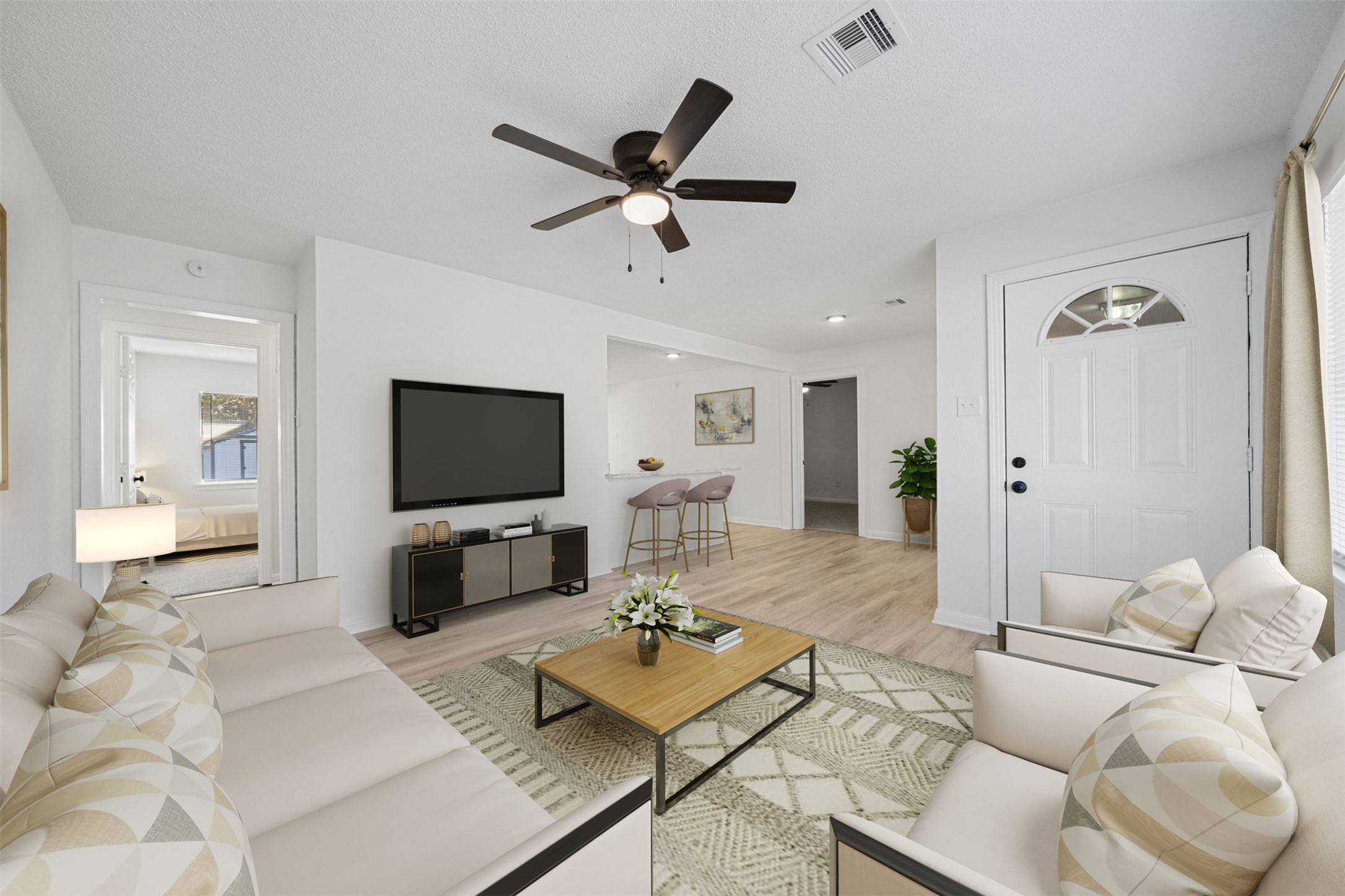 4601 West 43rd Street Houston, TX 77092 - Photo 3 of 40 a living room with furniture and a flat screen tv