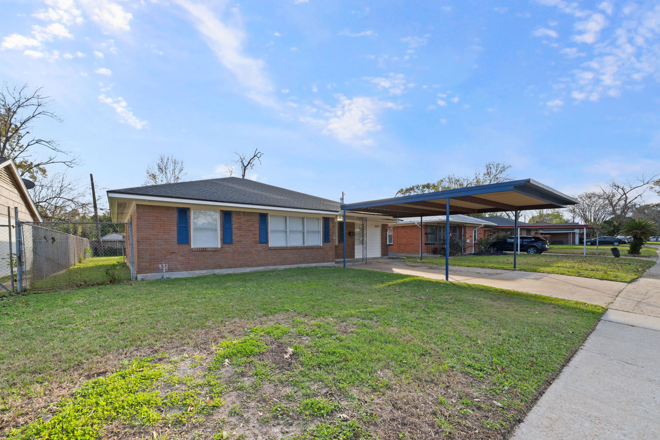 4601 West 43rd Street Houston, TX 77092 - Photo 31 of 40 a front view of a house with a yard