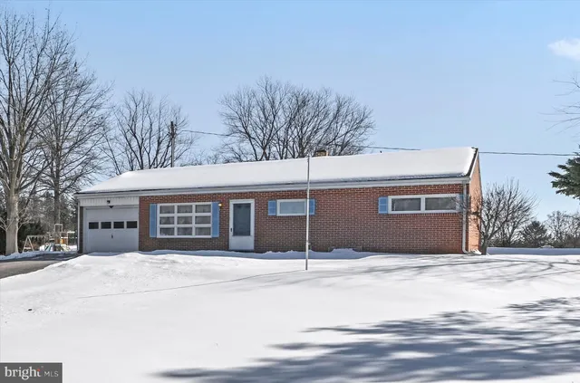 a house with trees in front of it