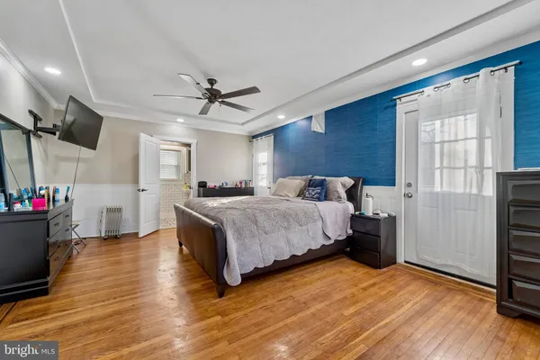 a bed room with a bed and a window