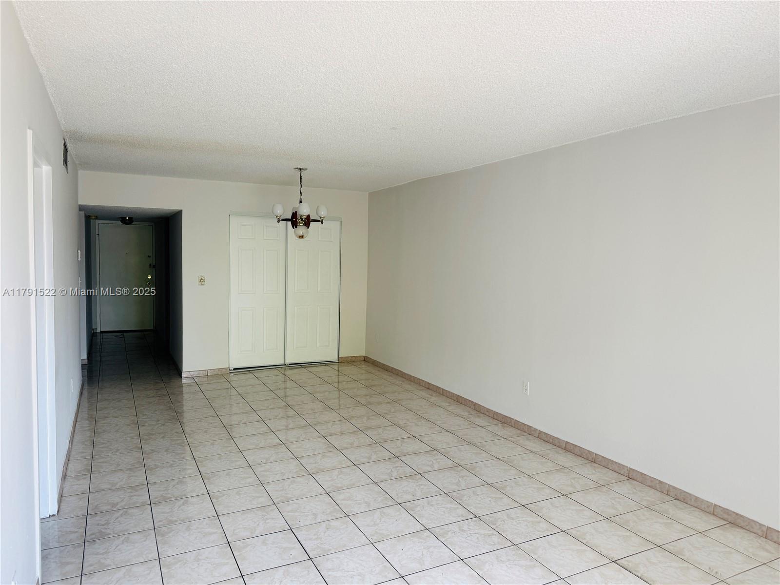 30 East 39th Street, Unit 217 Hialeah, FL 33013 - Photo 14 of 50 an empty room with a bathroom