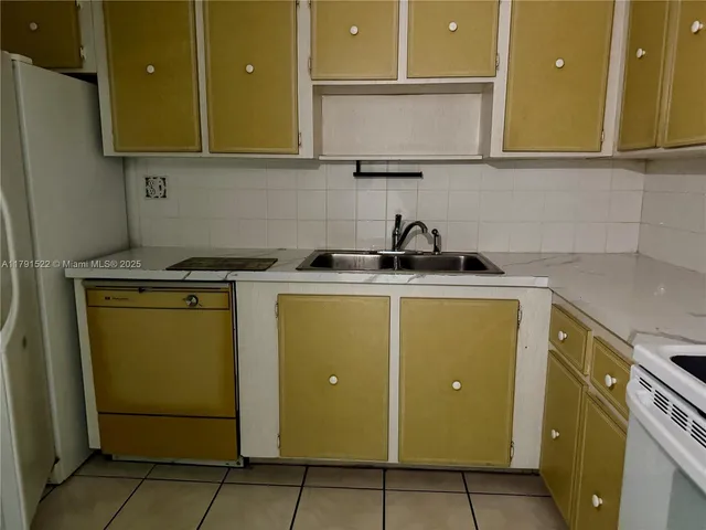 a bathroom with a sink and toilet