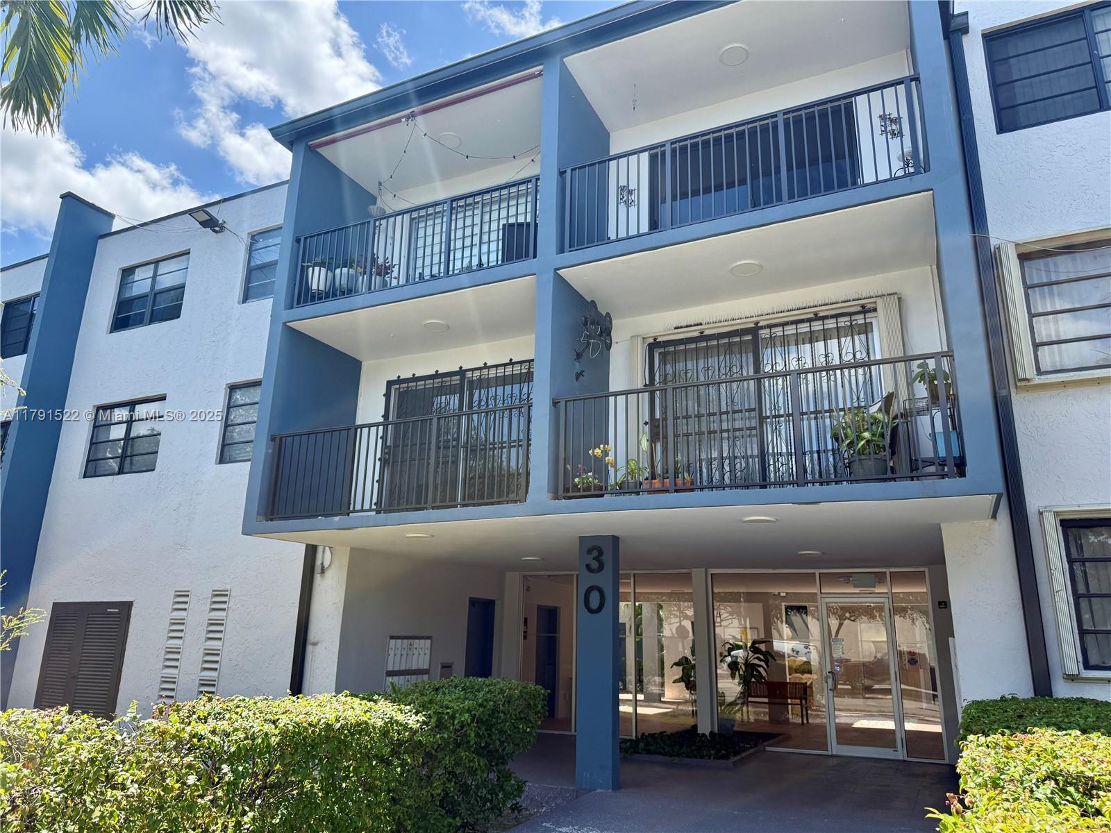 30 East 39th Street, Unit 217 Hialeah, FL 33013 - Photo 2 of 50 front view of a building