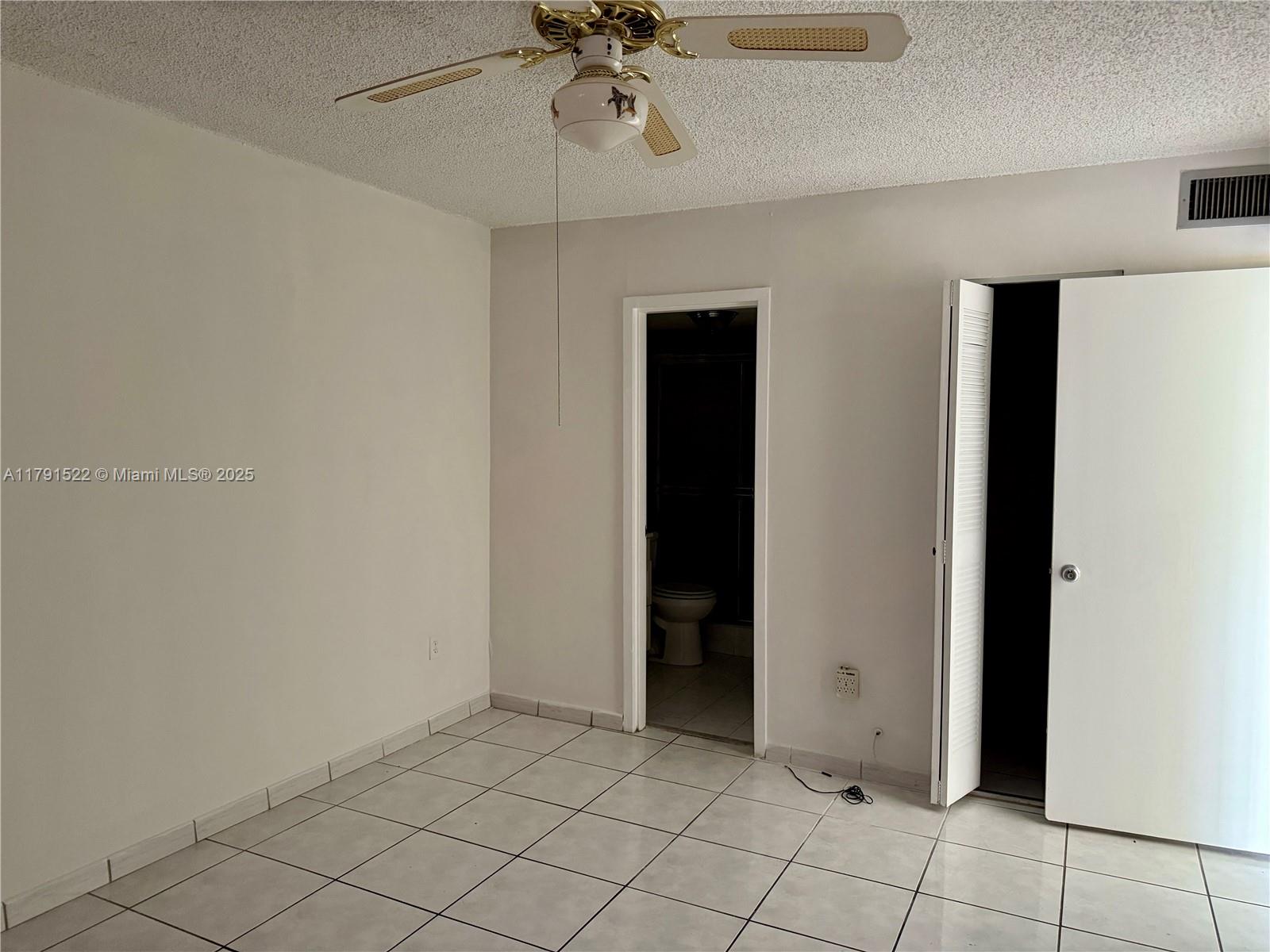 30 East 39th Street, Unit 217 Hialeah, FL 33013 - Photo 22 of 50 a view of an empty room