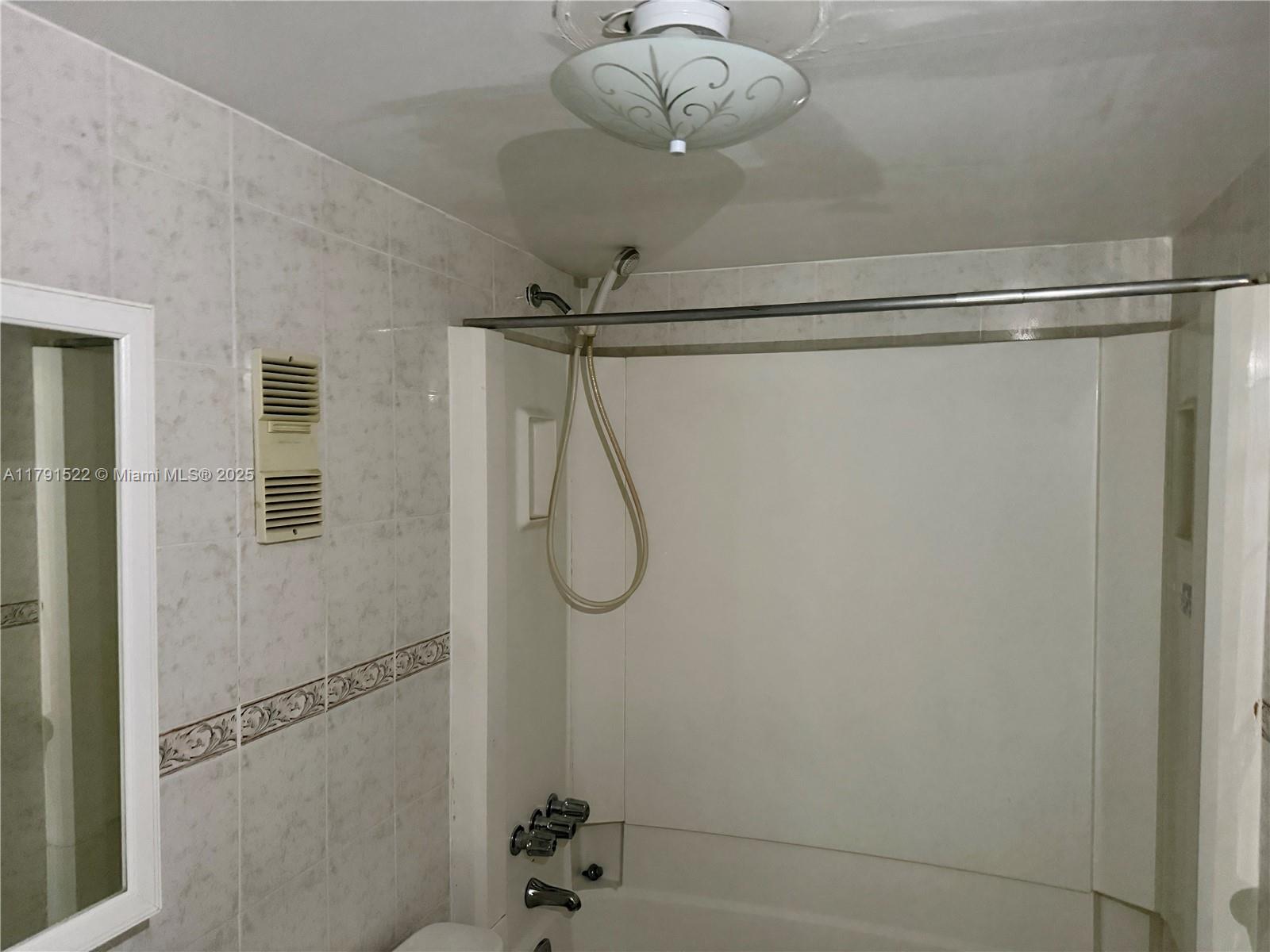 30 East 39th Street, Unit 217 Hialeah, FL 33013 - Photo 24 of 50 a bathroom with a shower