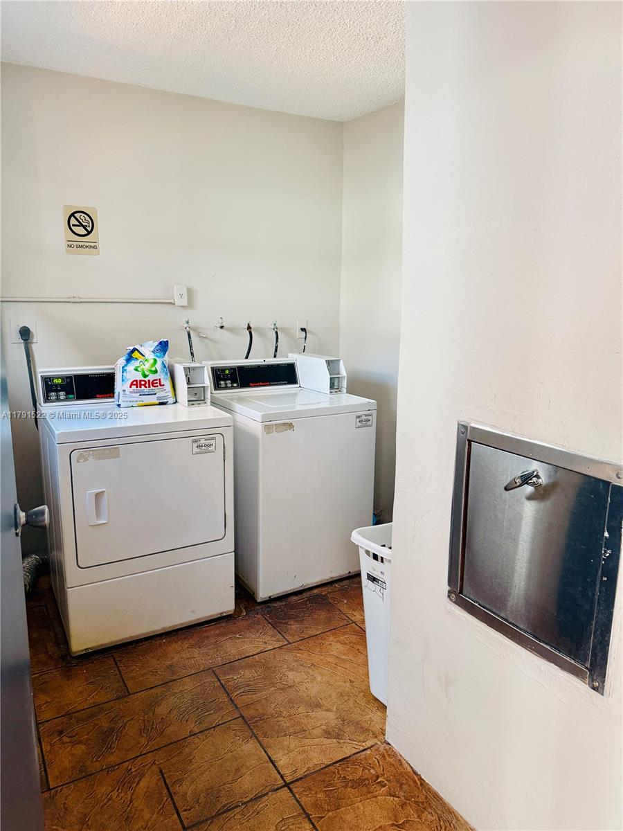 30 East 39th Street, Unit 217 Hialeah, FL 33013 - Photo 40 of 50 a utility room with dryer and washer