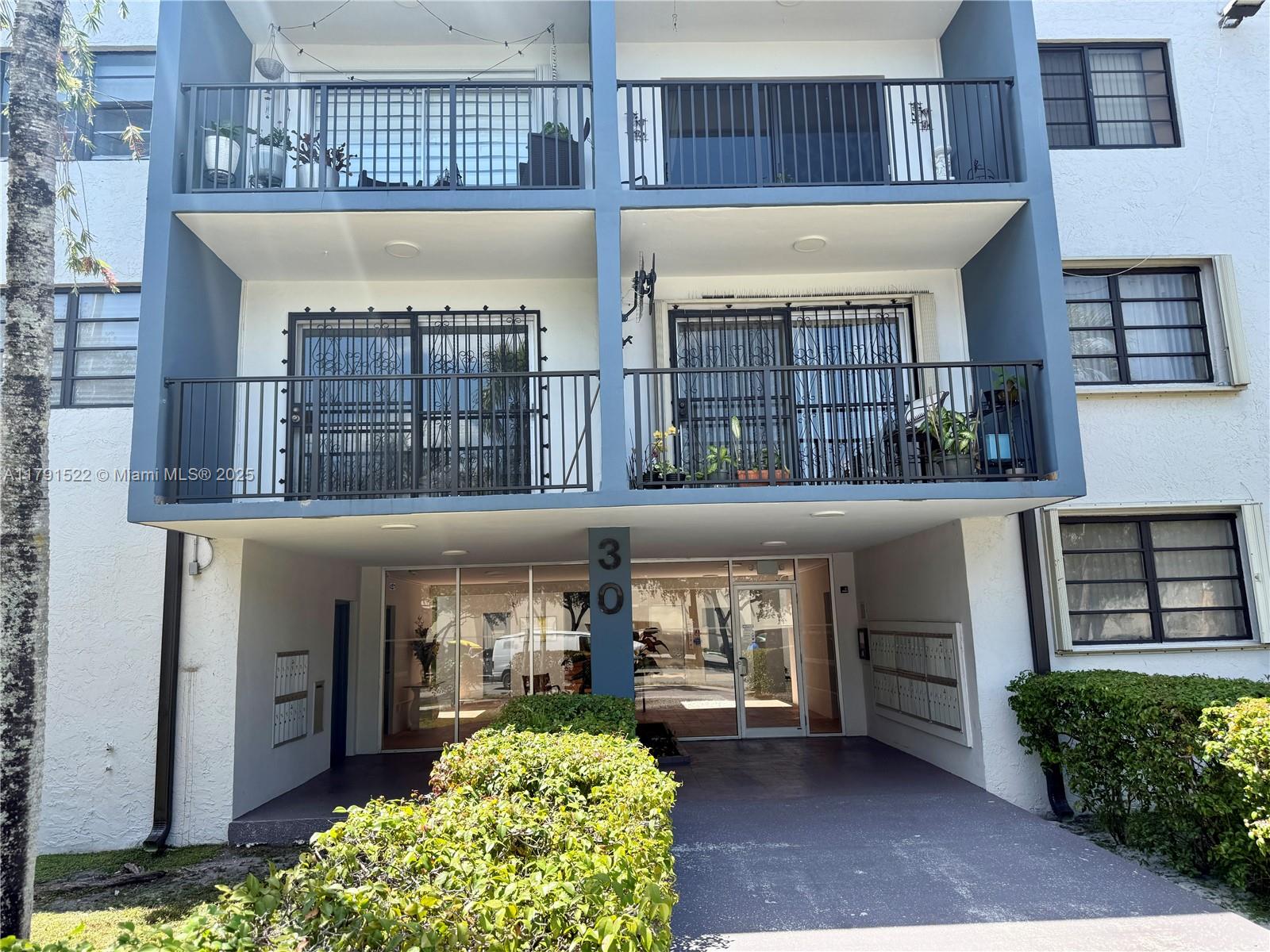 30 East 39th Street, Unit 217 Hialeah, FL 33013 - Photo 47 of 50 a front view of a house