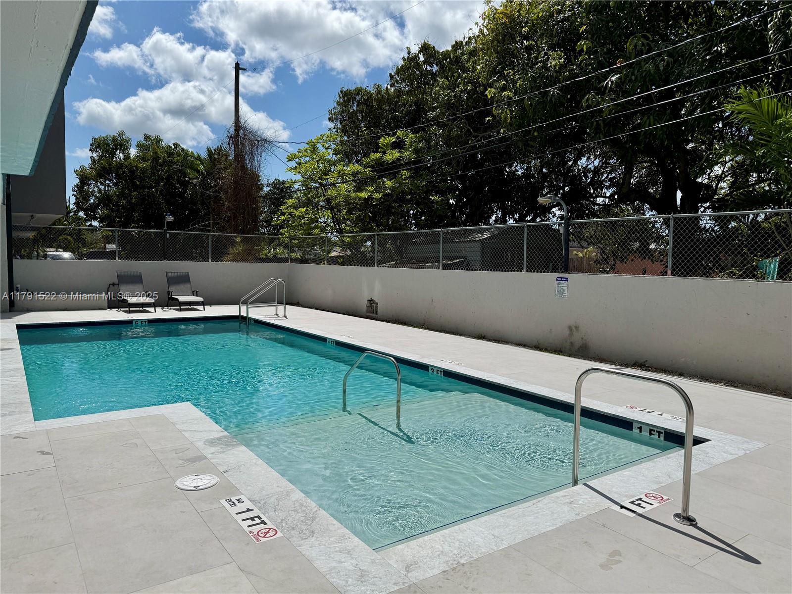 30 East 39th Street, Unit 217 Hialeah, FL 33013 - Photo 5 of 50 a view of a backyard