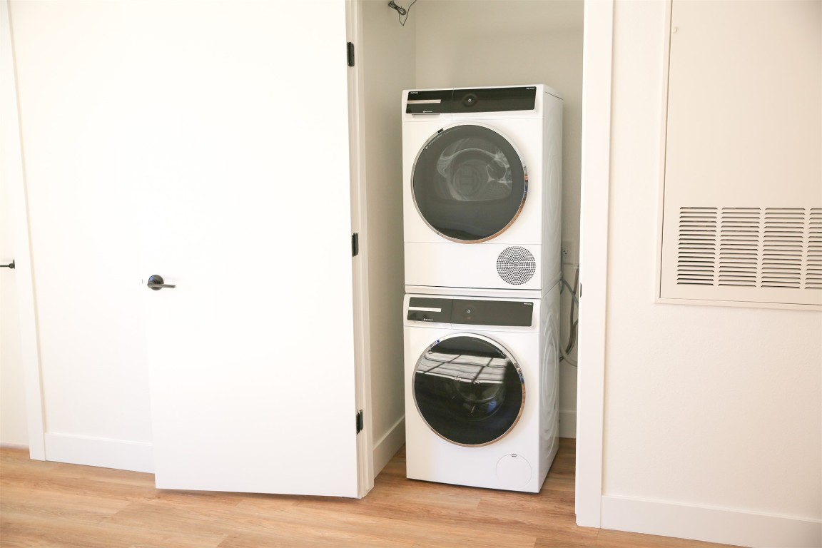 4315 South Congress Avenue, Unit 207 Austin, TX 78745 - Photo 11 of 12 a utility room with dryer and washer
